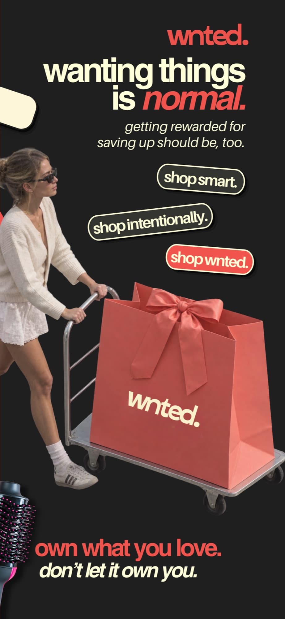 A shopper pushing a cart carrying a big coral wnted gift bag, beside stickers reading shop smart, shop intentionally, shop wnted.